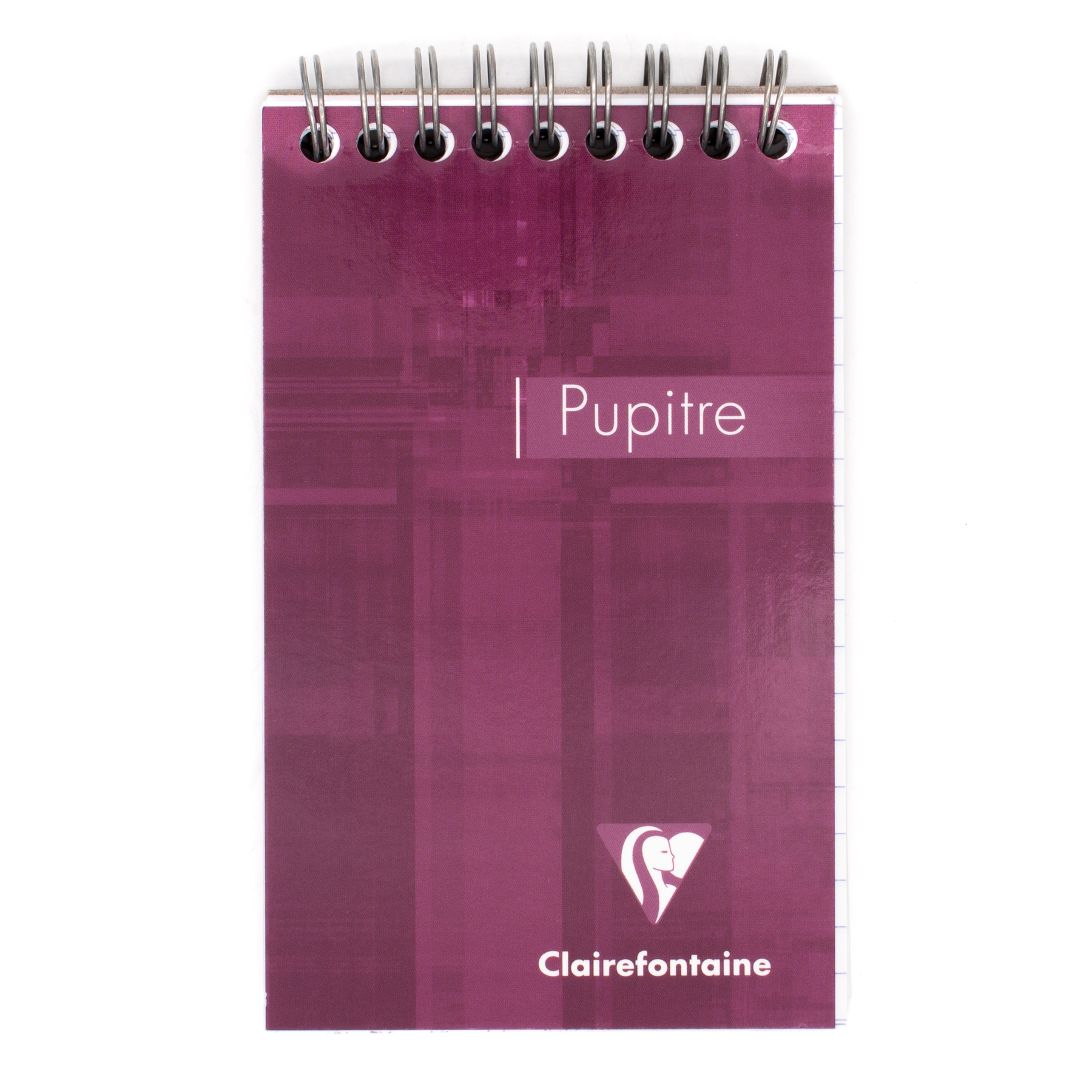A spiral-bound notebook with a plum purple cover featuring the white text 'Pupitre' and the Clairefontaine logo, shown on a plain white background.