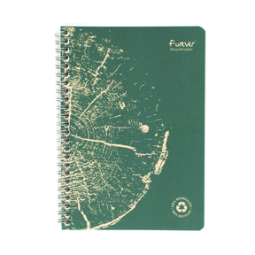 A green spiral-bound notebook made from recycled paper, featuring a distressed tree trunk pattern on the cover, with the name 'Forever' printed in the top right corner and a '100% recycled' logo in the bottom right corner.