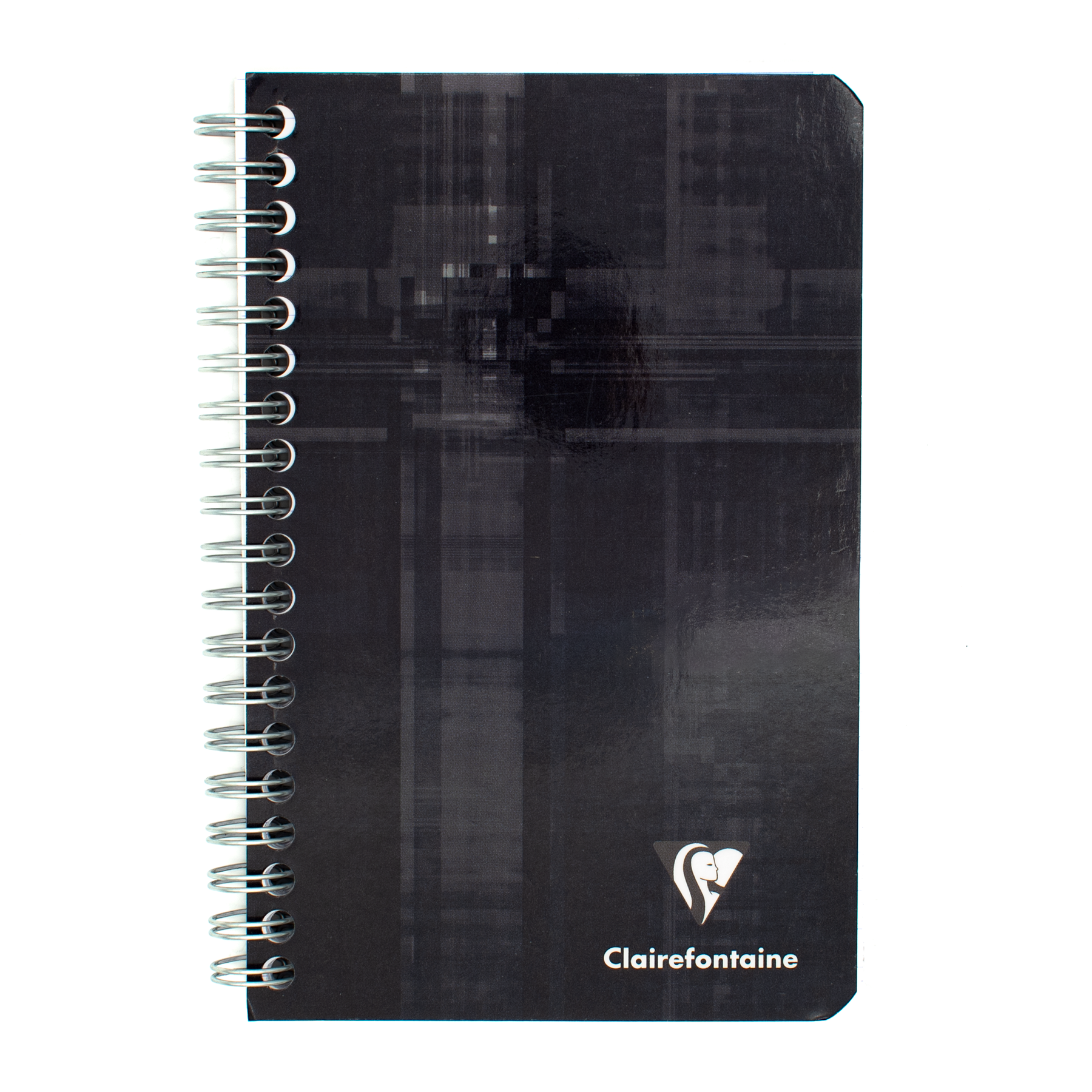 A black side wire bound notebook with the Clairefontaine logo located on the bottom right of the cover.