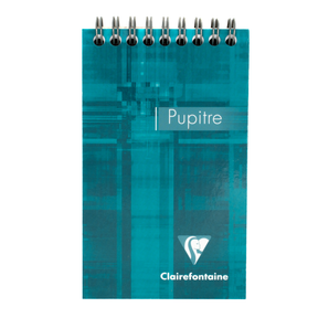 A teal top wire bound notepad with text that says 'Pupitre' and the Clairefontaine logo located in the bottom right corner of the cover. 