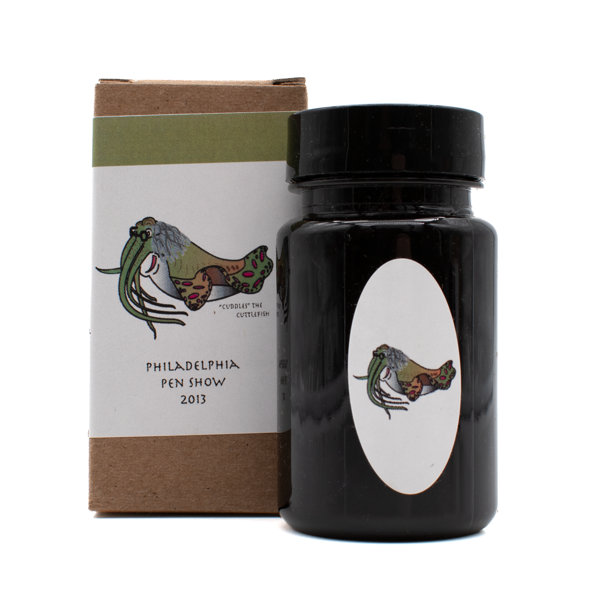 A bottle of Organics Studio 'Join or Die' in front of its brown box with a white and olive green label and black text on a white background.