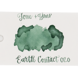 An ink swatch in jade green on white paper, with the text 'Tono+Lims' at the top and 'Earth Contact 020' at the bottom in matching green script on a plain white background.