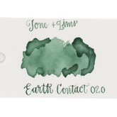 An ink swatch in jade green on white paper, with the text 'Tono+Lims' at the top and 'Earth Contact 020' at the bottom in matching green script on a plain white background.