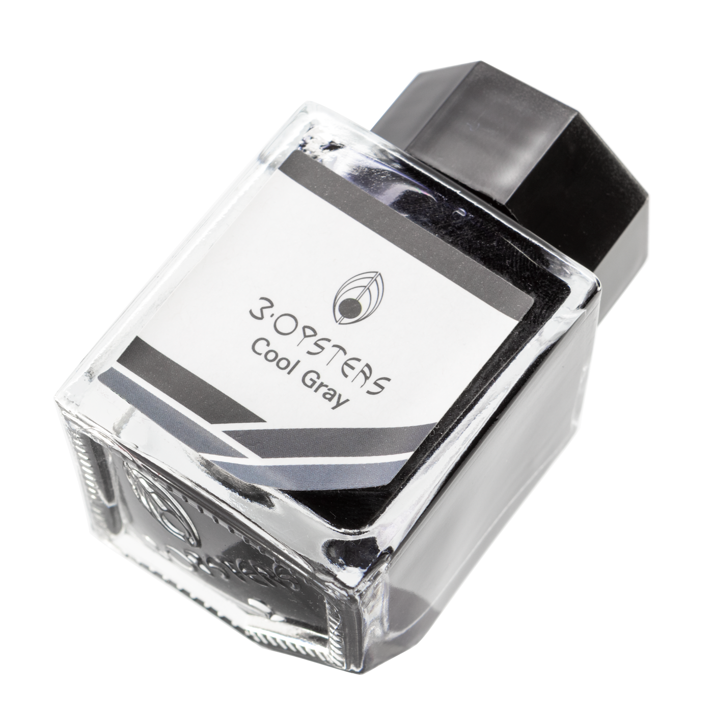 3 Oysters Cool Gray from the Delicious collection is a cool-tone medium grey fountain pen ink with medium shading. It dries in 30 seconds in a medium nib on Rhodia and has a slightly dry flow.The glass bottle has a cut out corner to lean the bottle for a decorative display. 3 Oysters ink is made in Korea.  Pantone color: 11C