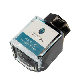 Turquoise green fountain pen ink from 3Oysters ink, made in Seoul, South Korea. these inks are designed for fountain pens. the ink is water based using ionized water and  dye-based colors. the colors are rich and deep with low sheen and shading. These inks are for wordsmithing, hand lettering, writing, calligraphy, drawing, and art.    Not waterproof